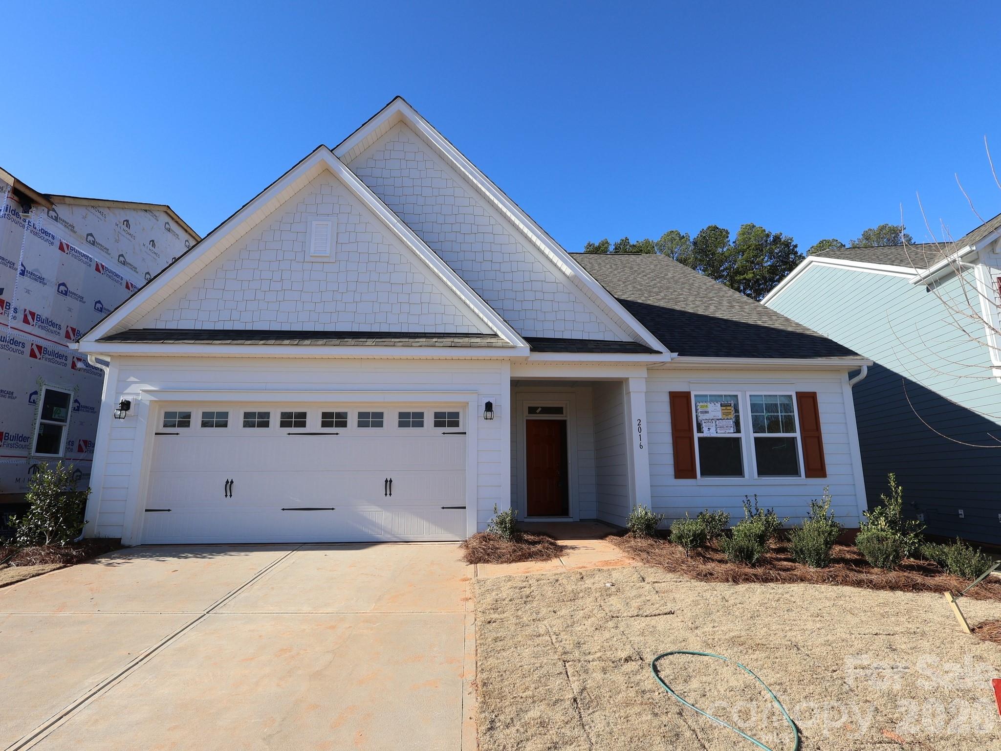 2016 Hackney Street Huntersville, NC 28078 - Photo 1 of 4 a view of a house with a yard