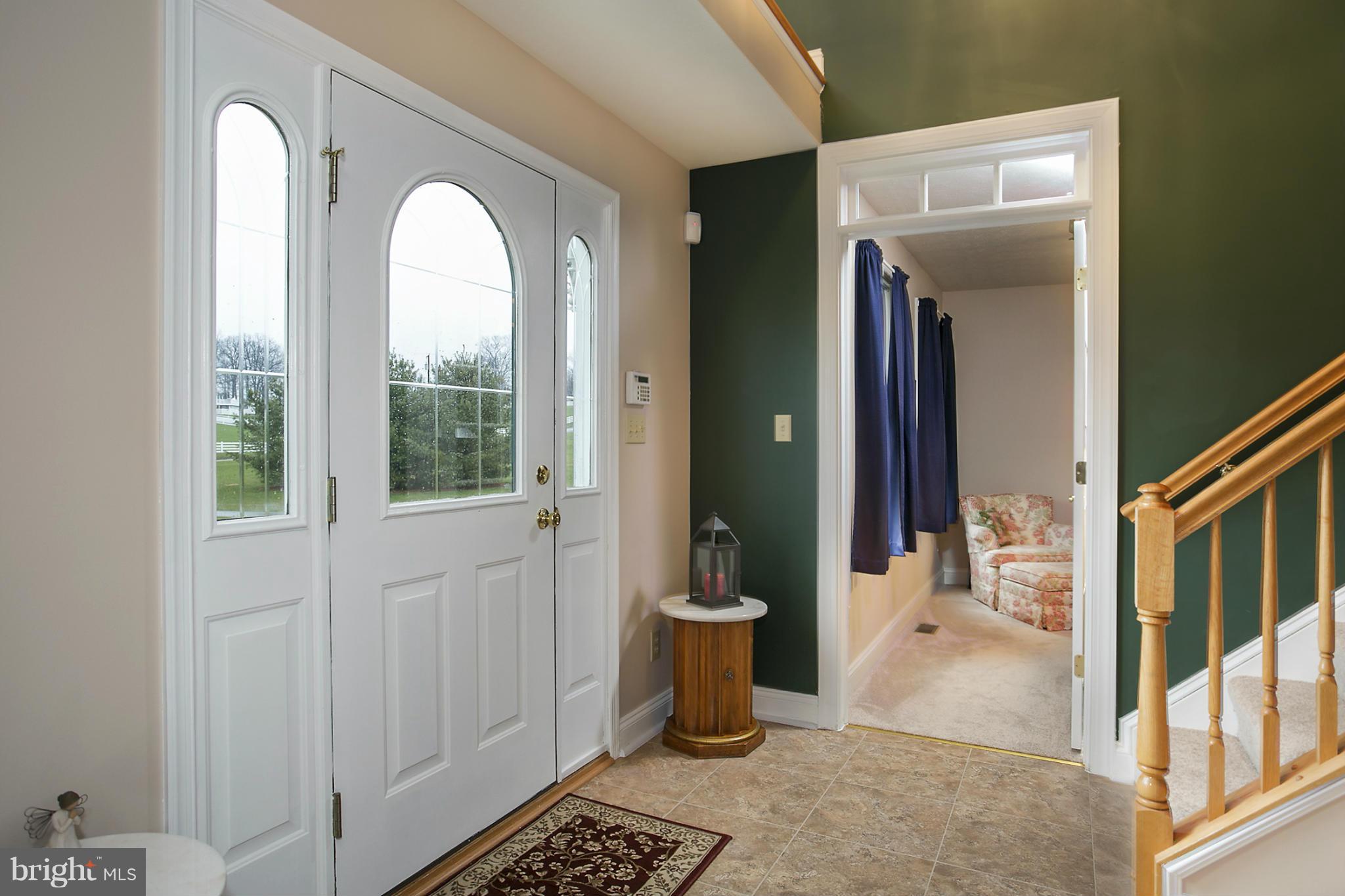 FOYER WITH NEW CERAMIC TILE FLOORING