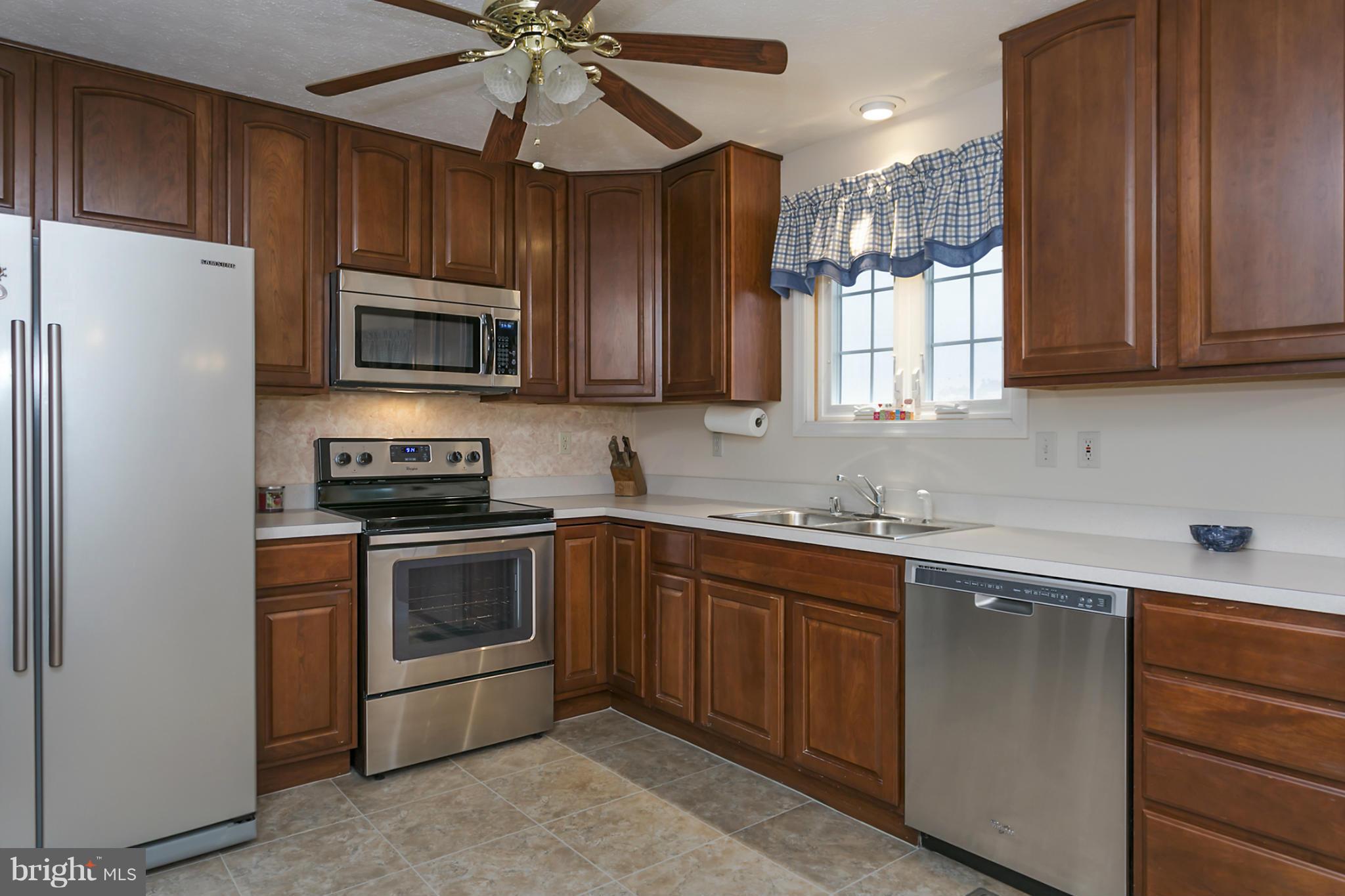4395 Wine Road Westminster, MD 21158 - Photo 10 of 26 KITCHEN WITH STAINLESS STEEL APPLIANCES