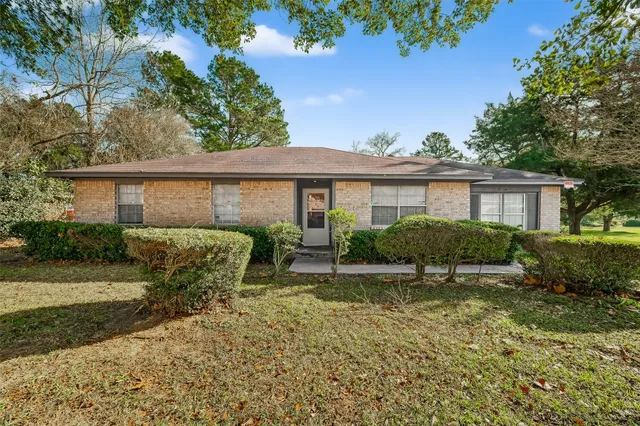 a view of a house with a street