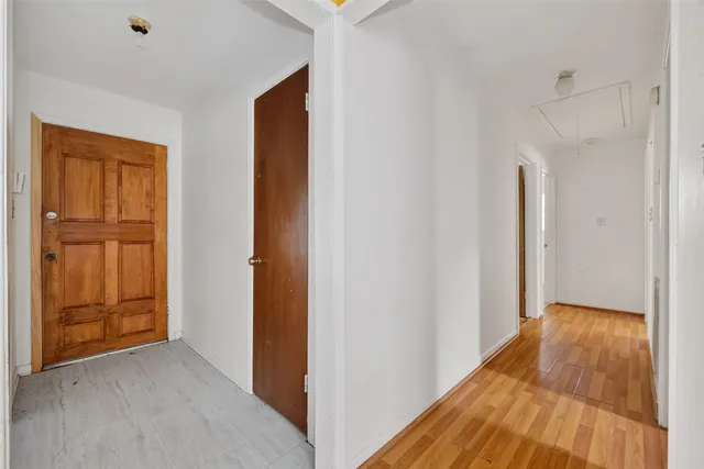 a view of empty room with ceiling fan