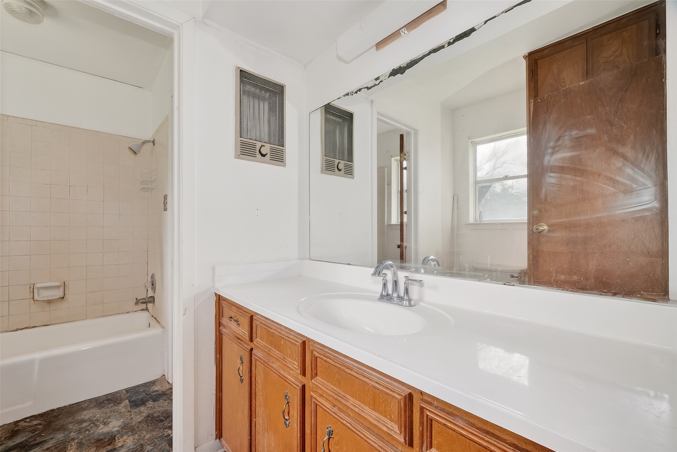 20706 Emerald Street Prairie View, TX 77484 - Photo 28 of 47 a bathroom with a sink double vanity granite tub shower and a mirror