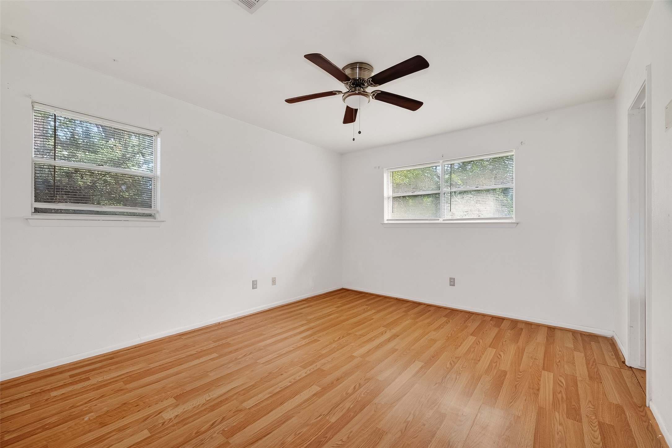 20706 Emerald Street Prairie View, TX 77484 - Photo 30 of 47 a view of empty room with wooden floor