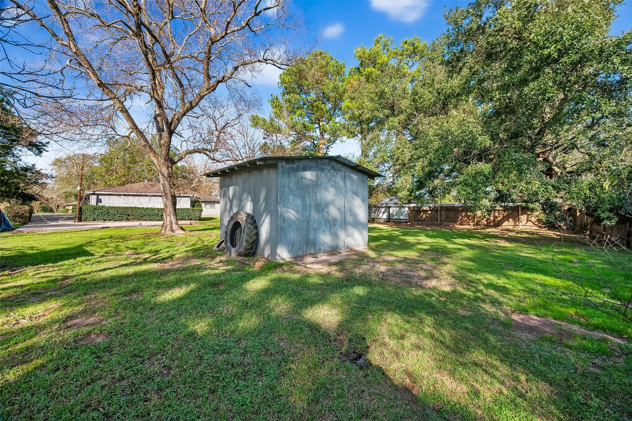20706 Emerald Street Prairie View, TX 77484 - Photo 42 of 47 a backyard of a house with lots of green space