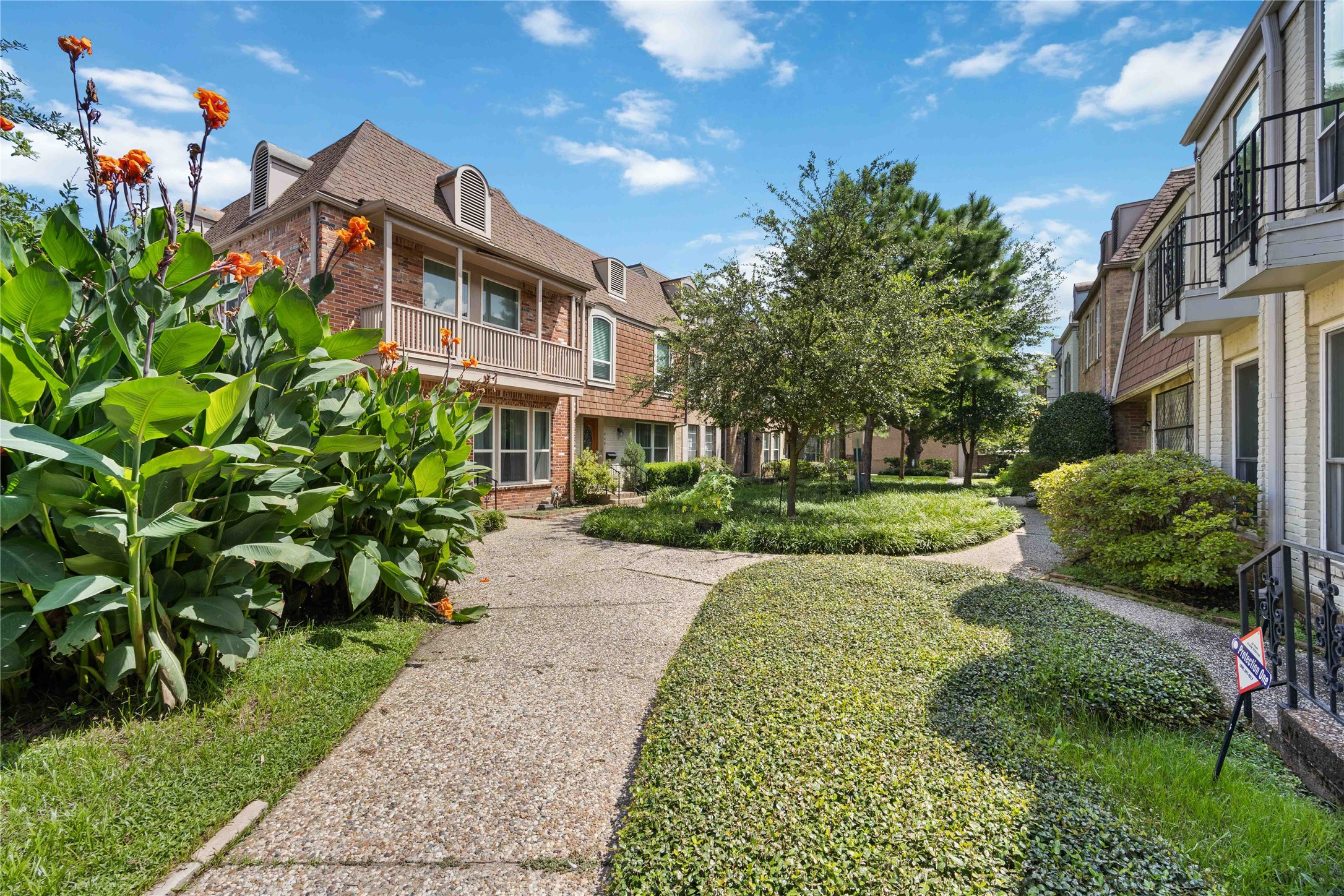 454 North Post Oak Lane Houston, TX 77024 - Photo 22 of 22 a front view of a house with a yard