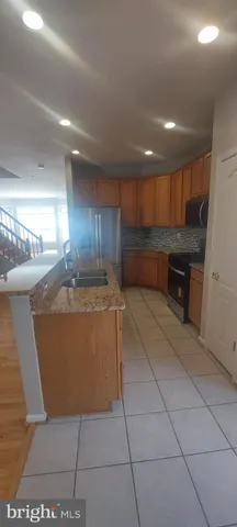 a view of an empty room with a empty space and a window