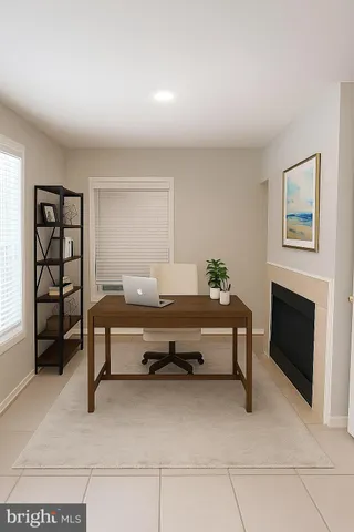 a spacious bedroom with a bed and a fireplace