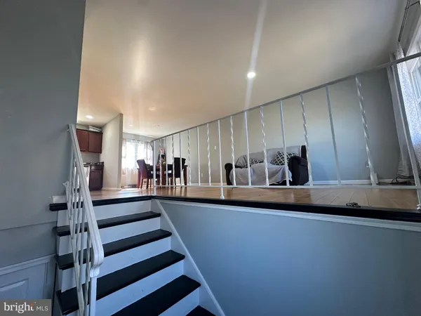 a view of a living room with furniture