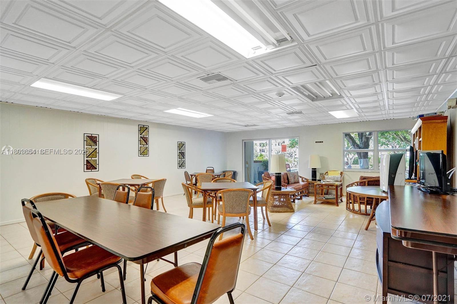 400 North Riverside Drive, Unit 214 Pompano Beach, FL 33062 - Photo 45 of 72 a view of a dining room with furniture