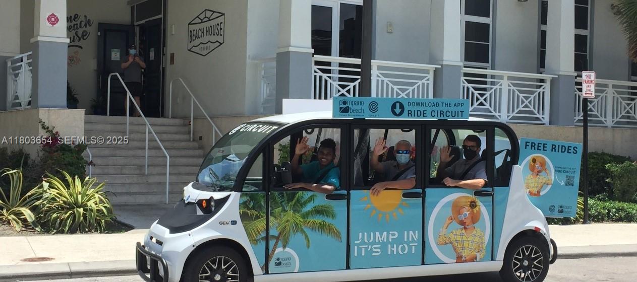 400 North Riverside Drive, Unit 214 Pompano Beach, FL 33062 - Photo 57 of 72 a view of walk in closet with clothes