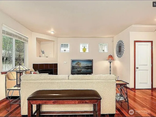 a room with furniture and a window