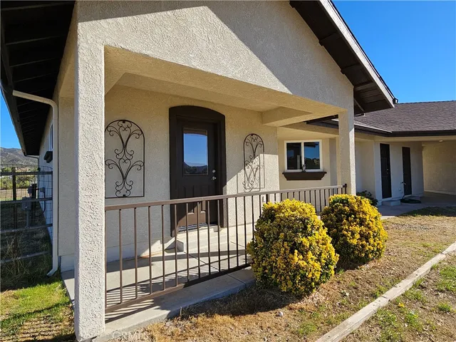 a view of a house with a porch