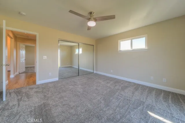 a view of staircase with a flat screen tv
