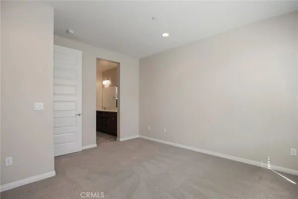 an empty room with an entryway