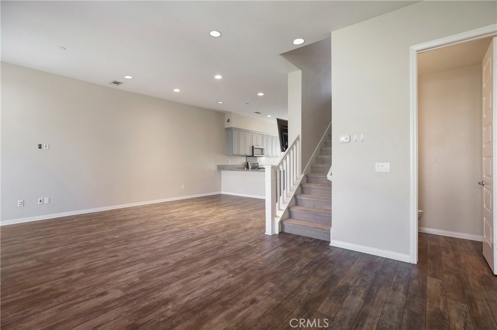 116 Neptune Irvine, CA 92618 - Photo 5 of 25 a view of entryway with wooden floor