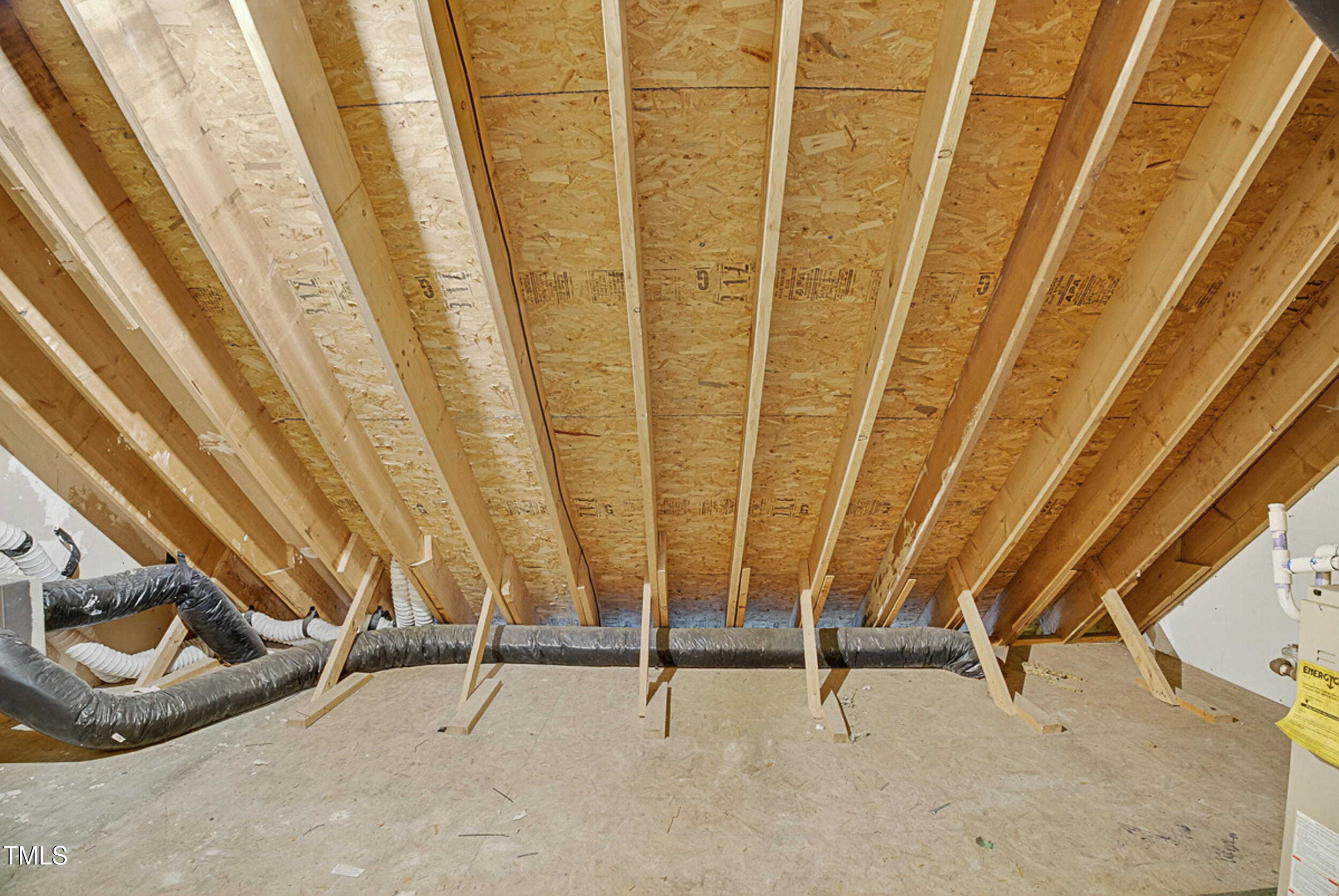 2407 Trout Stream Drive Raleigh, NC 27604 - Photo 23 of 24 a view of a room with wooden floor and windows