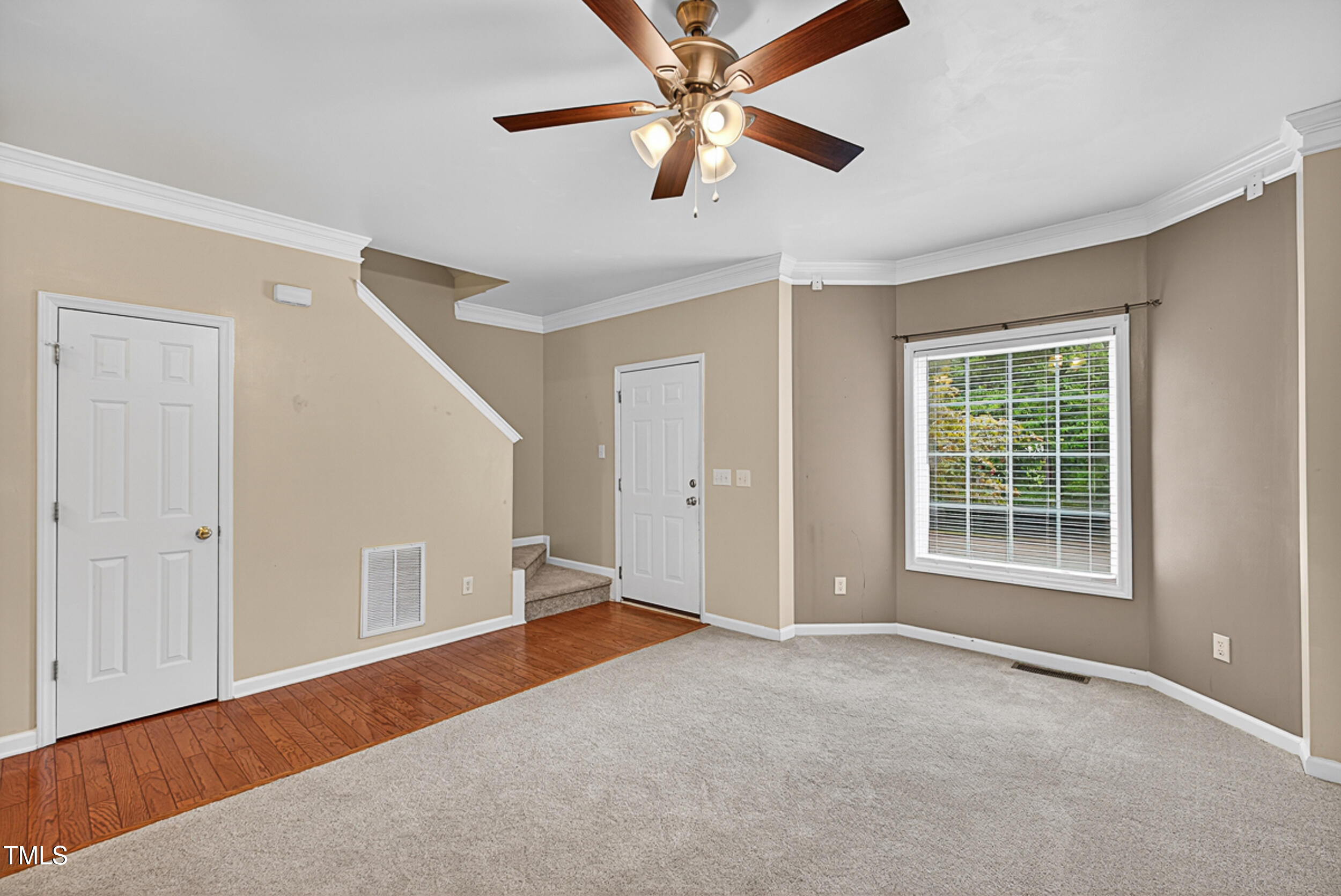 2407 Trout Stream Drive Raleigh, NC 27604 - Photo 6 of 24 a view of an empty room with a window