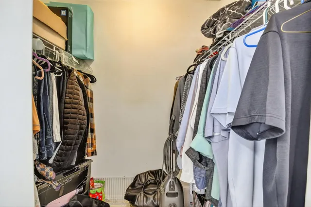 a en suite bathroom with a sink and a mirror