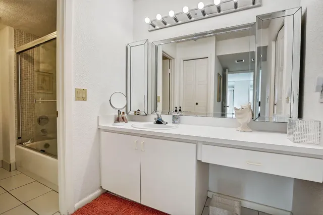 a bathroom with a toilet and a bathtub