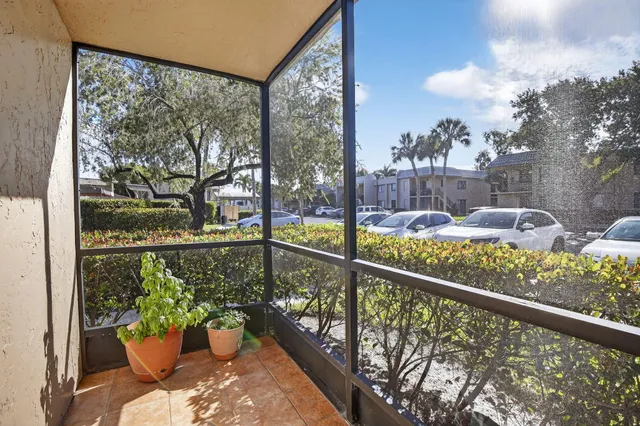 a view of a balcony with lake view