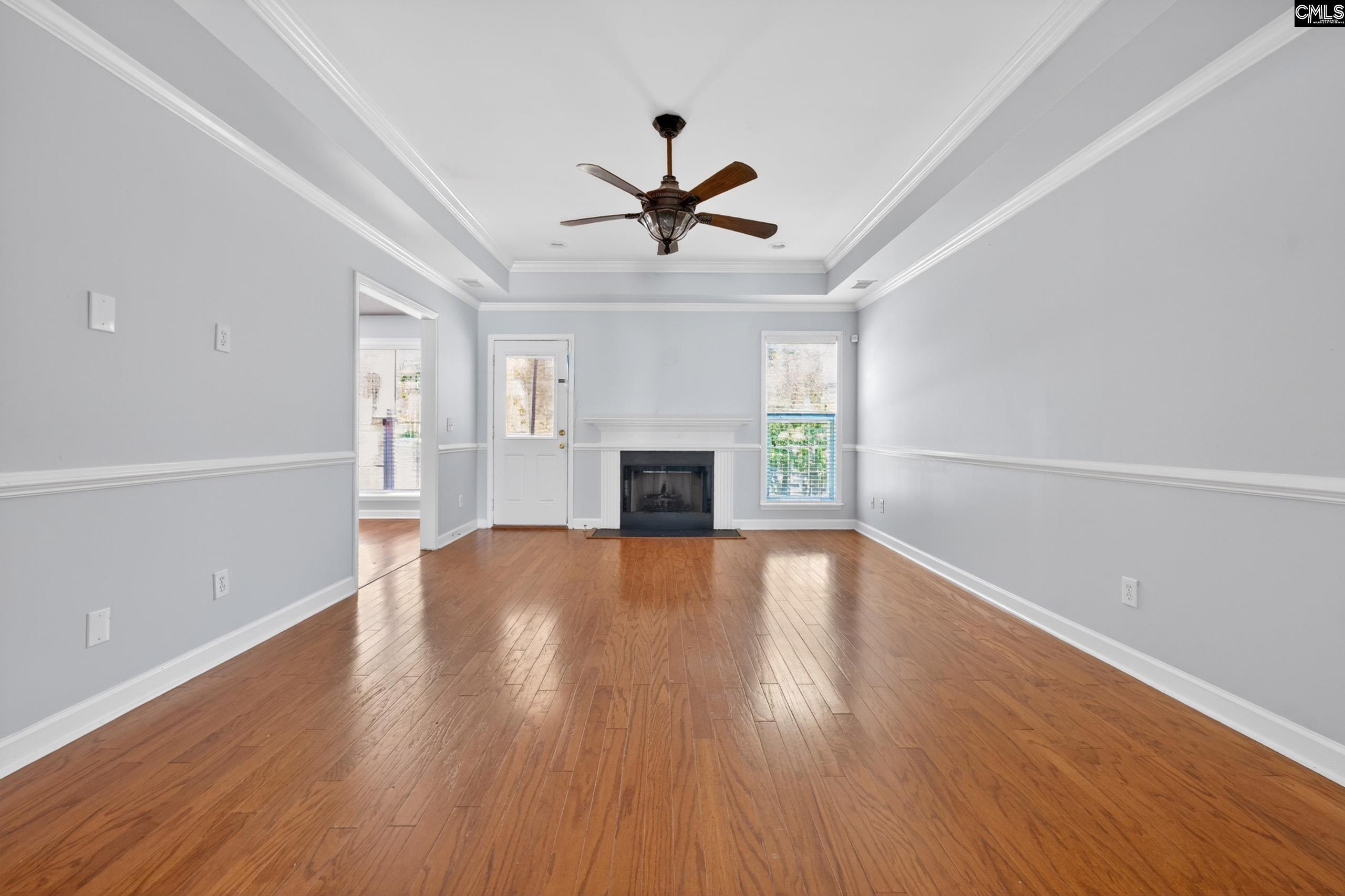 219 Plantation Pointe Drive Elgin, SC 29045 - Photo 32 of 56 wooden floor in an empty room with a window