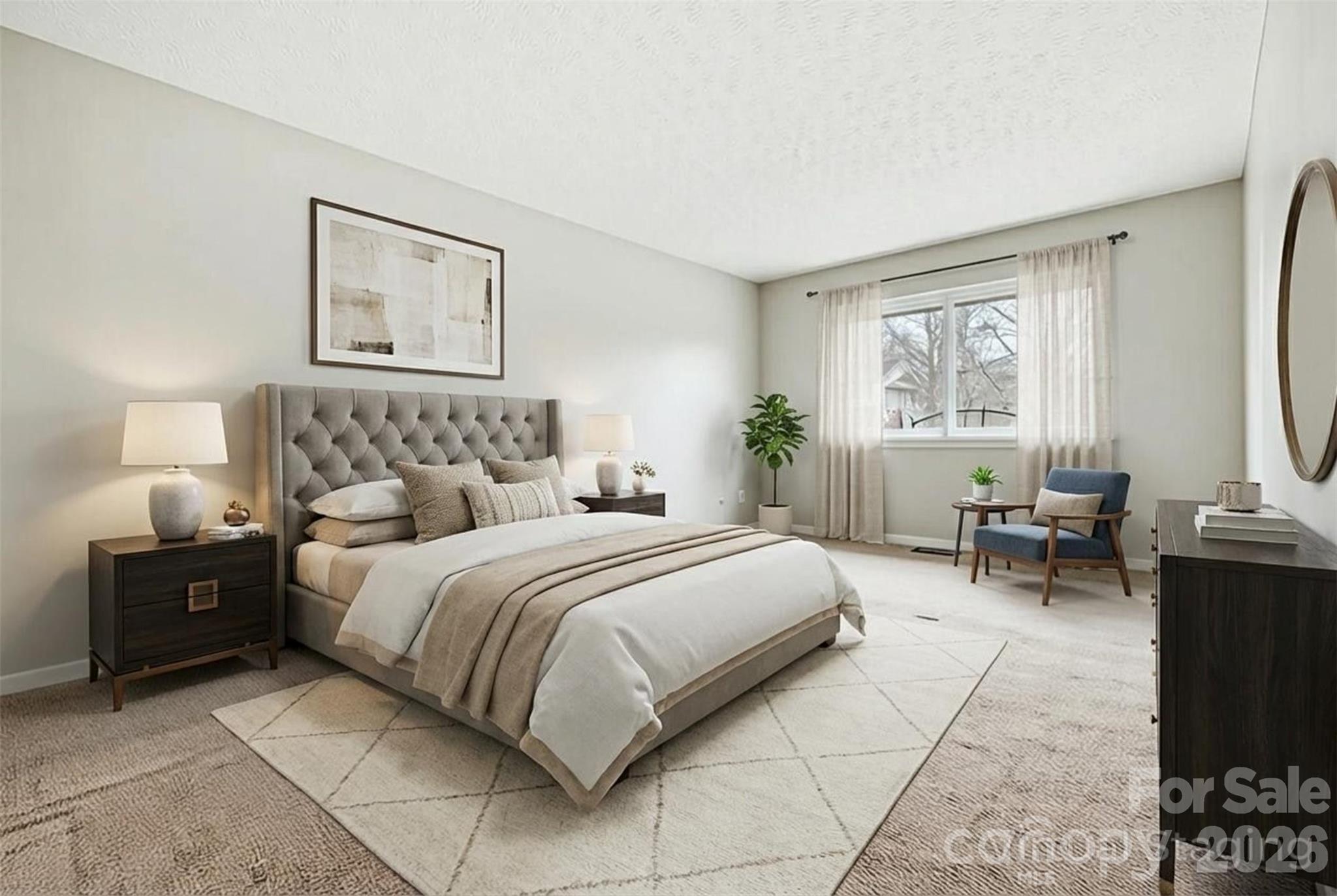 8011 Beacon Hills Road Indian Trail, NC 28079 - Photo 15 of 31 a bedroom with a bed and a couch