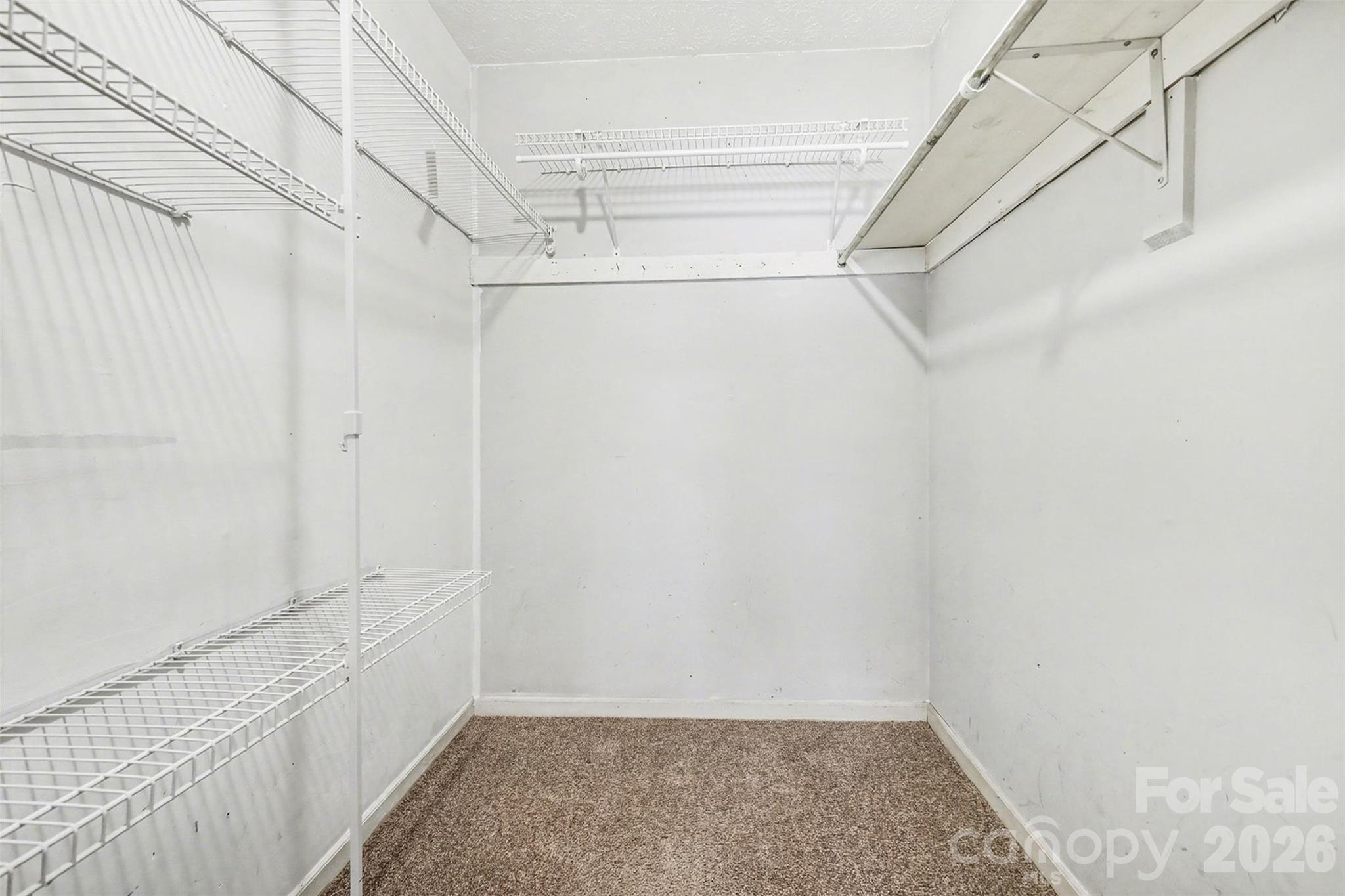 8011 Beacon Hills Road Indian Trail, NC 28079 - Photo 17 of 31 a view of a room with racks on the wall