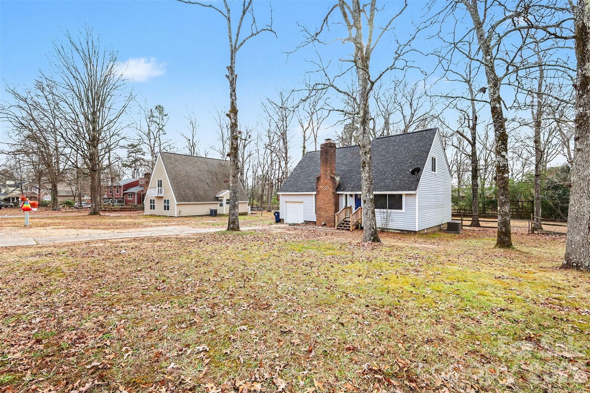 8011 Beacon Hills Road Indian Trail, NC 28079 - Photo 30 of 31 a view of a backyard with a tree
