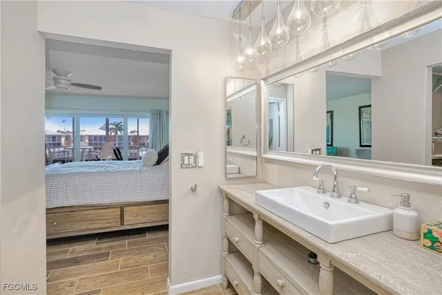 an aerial view of a house with a lake view