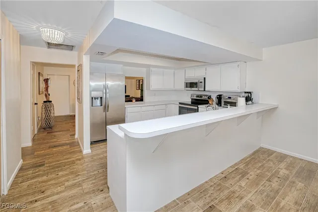 $290,000 | 4116 Southeast 20th Place, Unit 202, Cape Coral, FL 33904