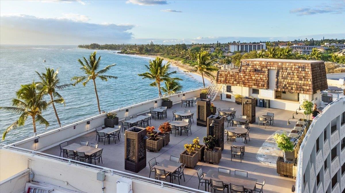 2430 South Kihei Road, Unit 206 Kihei, HI 96753 - Photo 30 of 40 a view of a terrace with wooden floor and outdoor seating