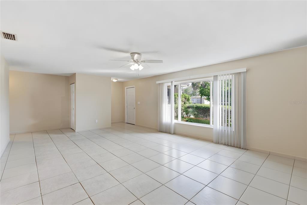 1437 Rommel Street Port Charlotte, FL 33952 - Photo 11 of 47 a view of an empty room with a window