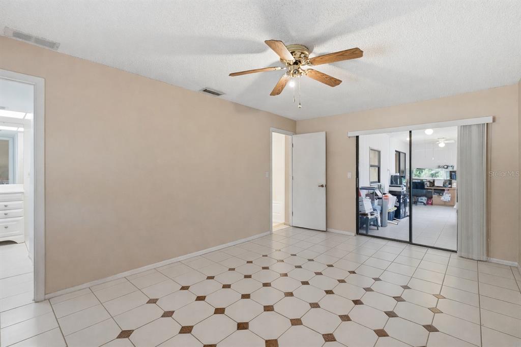 1437 Rommel Street Port Charlotte, FL 33952 - Photo 20 of 47 a view of a livingroom with wooden floor and a window
