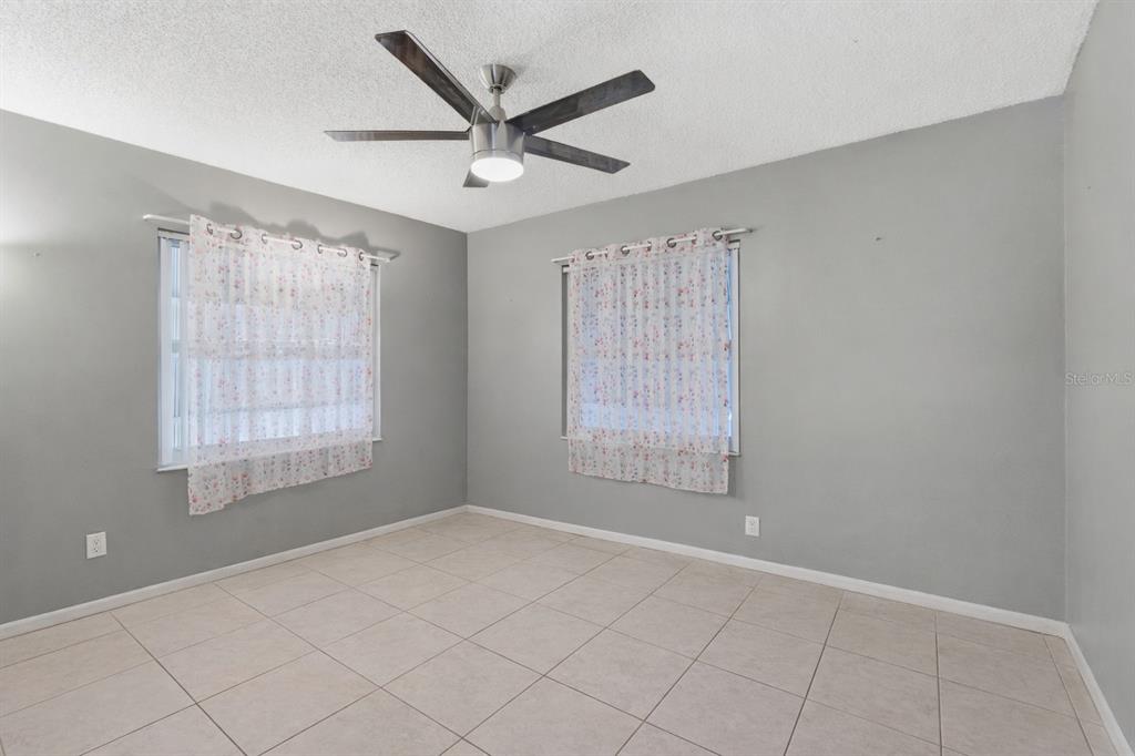 1437 Rommel Street Port Charlotte, FL 33952 - Photo 24 of 47 a view of an empty room with a window
