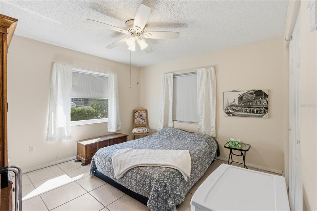 1437 Rommel Street Port Charlotte, FL 33952 - Photo 28 of 47 a bedroom with a bed and a window