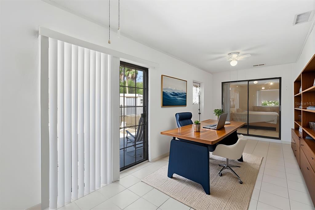 1437 Rommel Street Port Charlotte, FL 33952 - Photo 31 of 47 a room with furniture and window