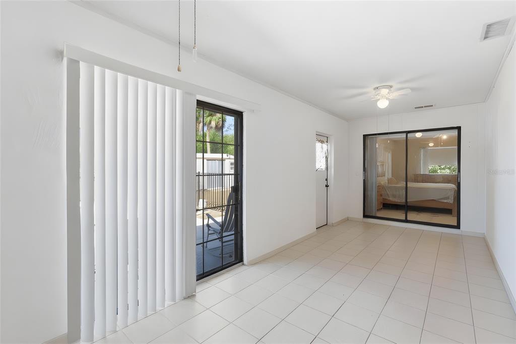 1437 Rommel Street Port Charlotte, FL 33952 - Photo 32 of 47 an empty room with windows