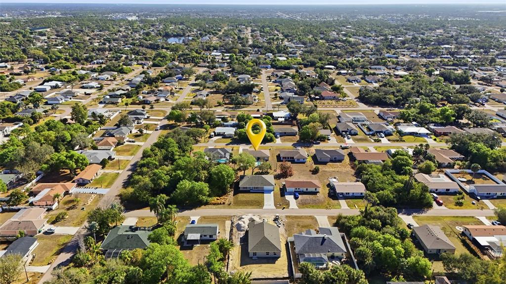 1437 Rommel Street Port Charlotte, FL 33952 - Photo 4 of 47 an aerial view of multiple house