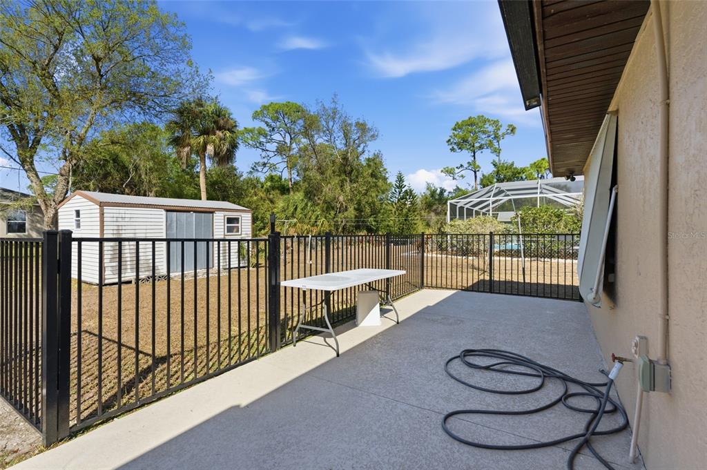 1437 Rommel Street Port Charlotte, FL 33952 - Photo 41 of 47 a view of a porch with furniture