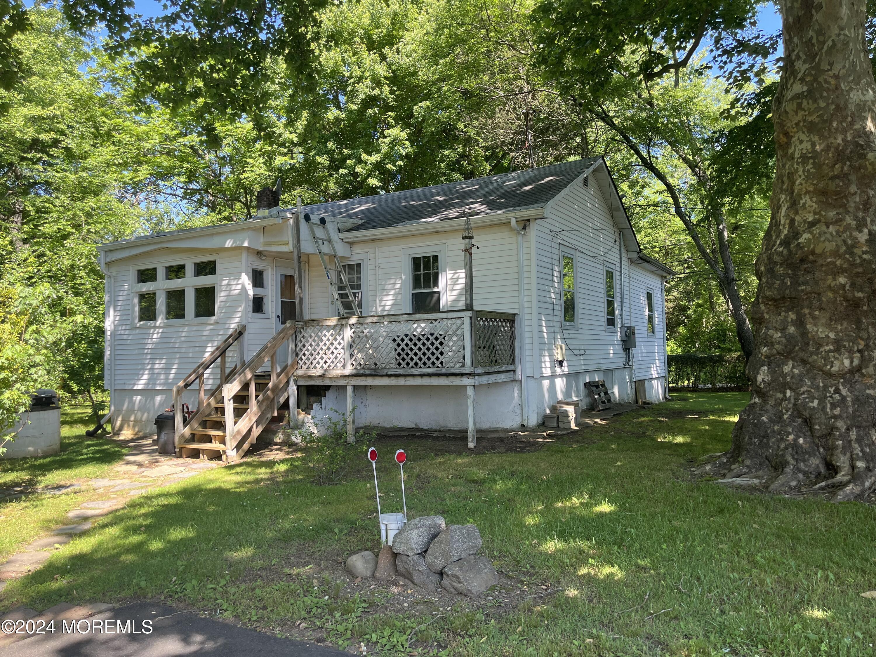 23 Robbins Road North Millstone Township, NJ 08535 - Photo 3 of 12 a view of a house with a yard