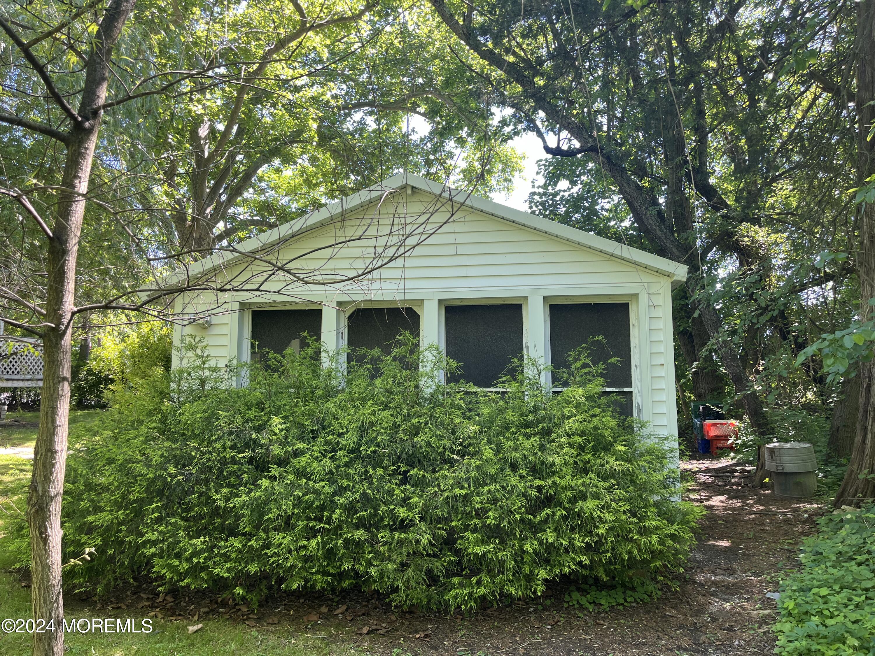 23 Robbins Road North Millstone Township, NJ 08535 - Photo 5 of 12 a front view of a house with garden