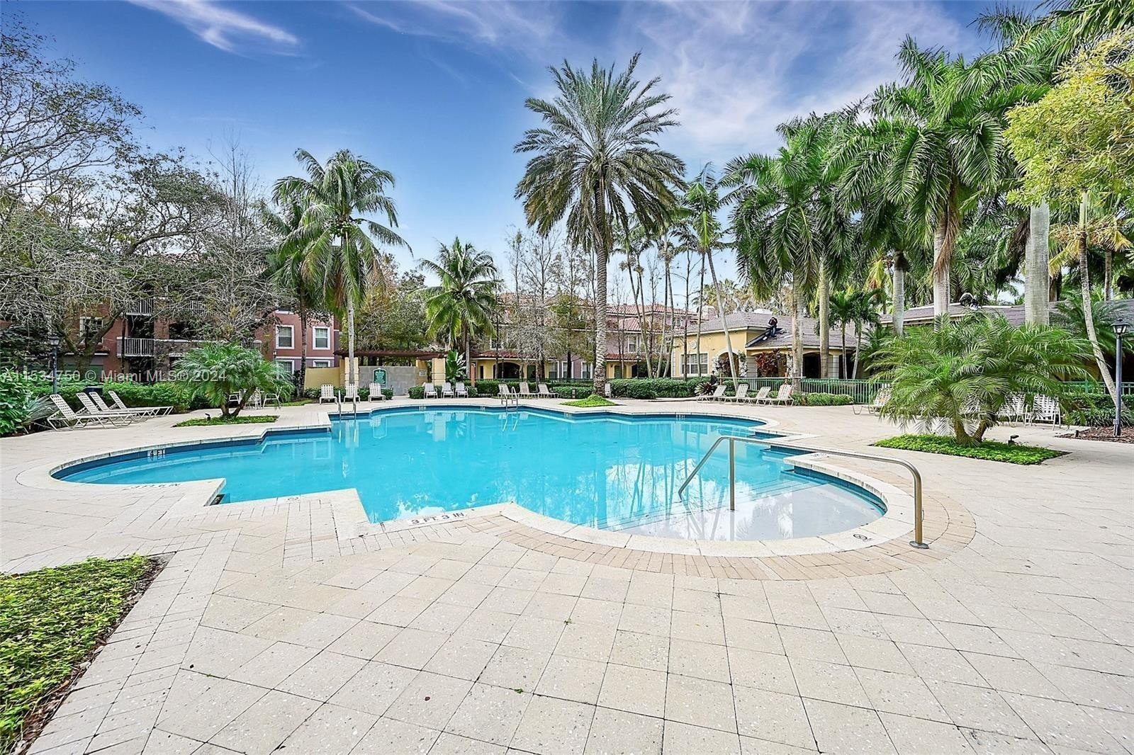 6928 West Sample Road, Unit 6928 Coral Springs, FL 33067 - Photo 14 of 16 Dive into sparkling blue waters!