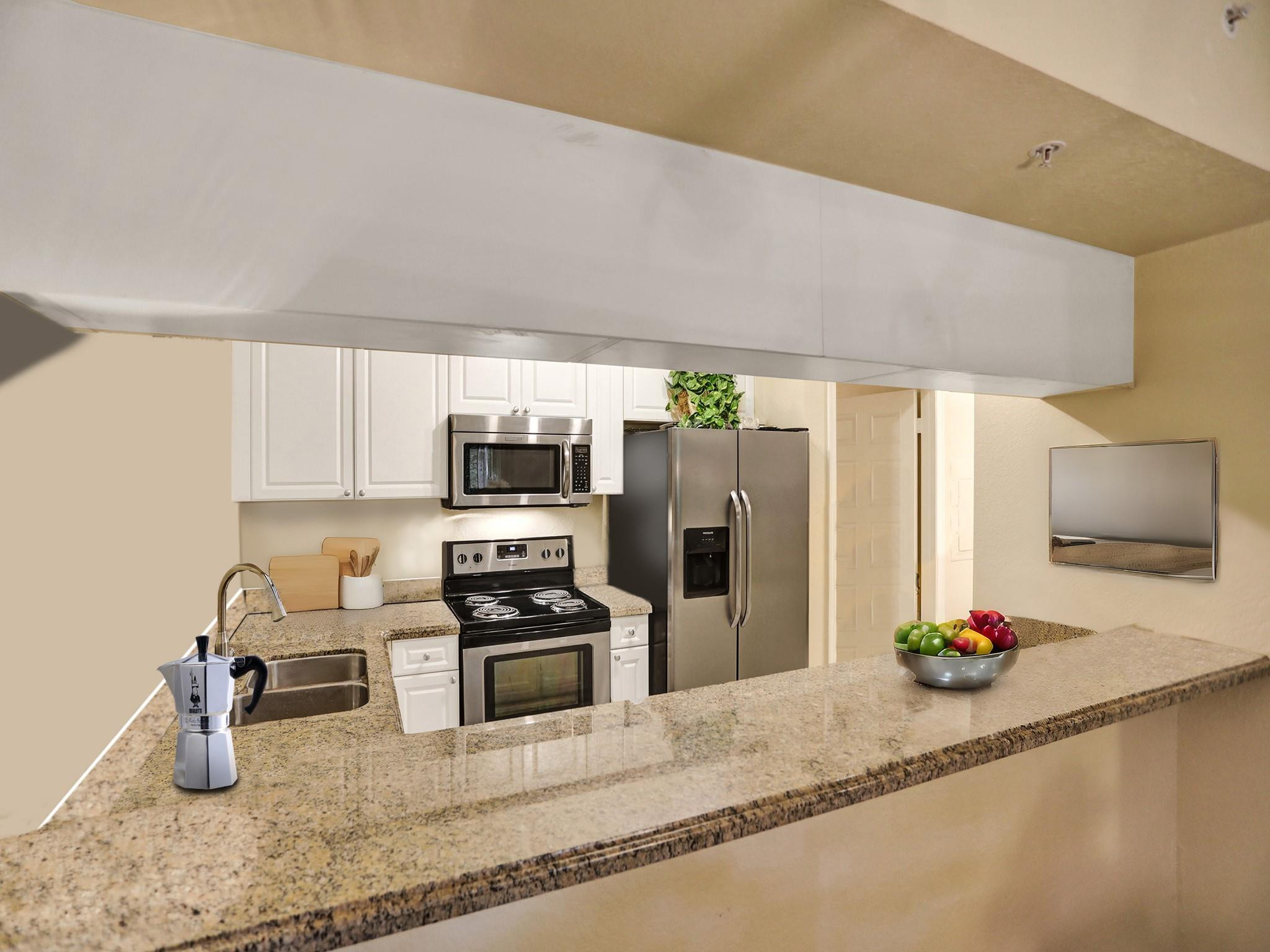 6928 West Sample Road, Unit 6928 Coral Springs, FL 33067 - Photo 3 of 16 With pantry and granite counters!