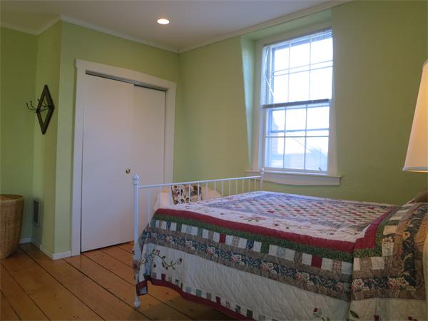 1 Rice Circle Cambridge, MA 02140 - Photo 11 of 18 a bedroom with a bed and a window