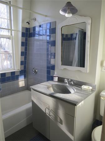 1 Rice Circle Cambridge, MA 02140 - Photo 13 of 18 a bathroom with a sink and a mirror