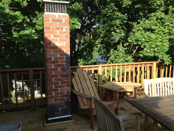 1 Rice Circle Cambridge, MA 02140 - Photo 16 of 18 a view of a wooden chairs and table in the balcony