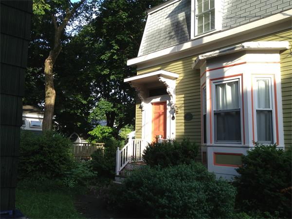 1 Rice Circle Cambridge, MA 02140 - Photo 17 of 18 a view of a house with a plants next to a road