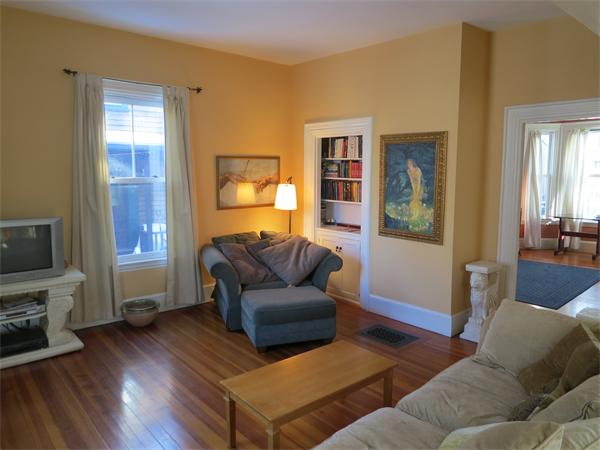 1 Rice Circle Cambridge, MA 02140 - Photo 3 of 18 a living room with furniture and a flat screen tv