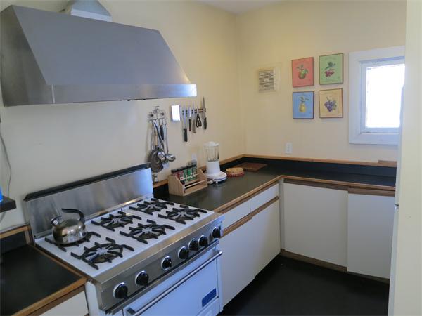 1 Rice Circle Cambridge, MA 02140 - Photo 6 of 18 a kitchen with a stove and a sink