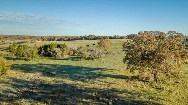 a view of a lake with a big yard